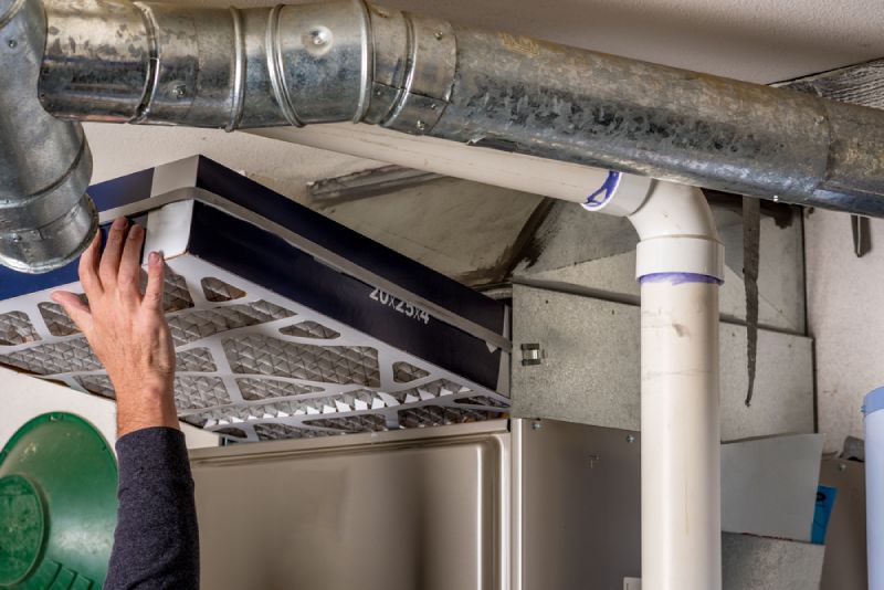 contractor installing air vents
